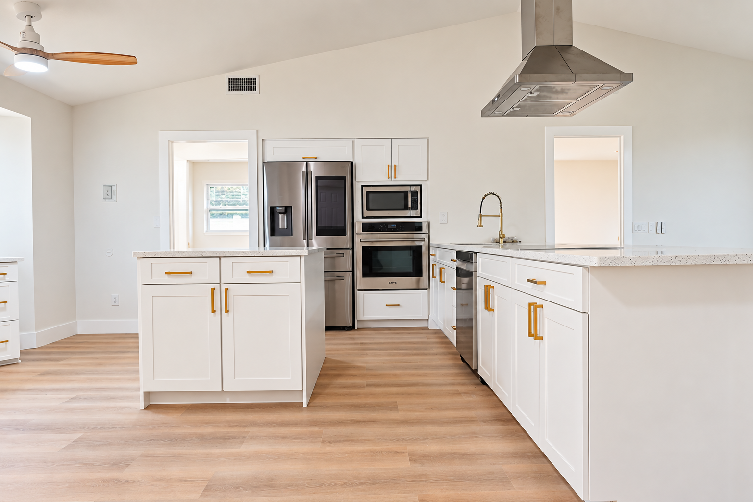 Custom kitchen cabinets and quartz countertops installed by CAG Proma